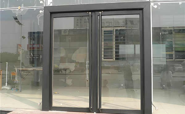临夏玻璃地弹门